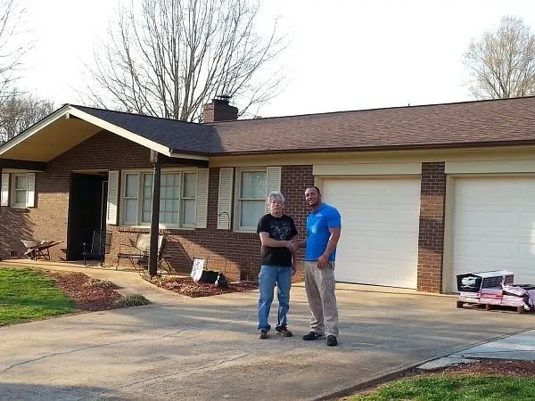 Slide of JC Restoration and Roofing