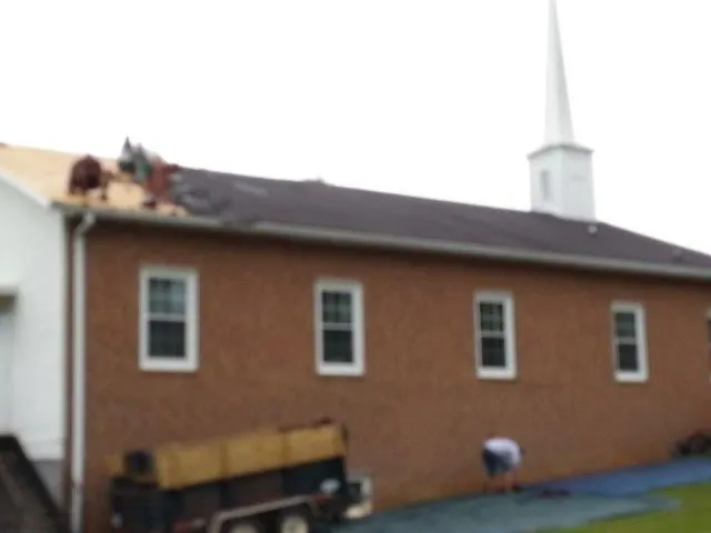 Slide of JC Restoration and Roofing