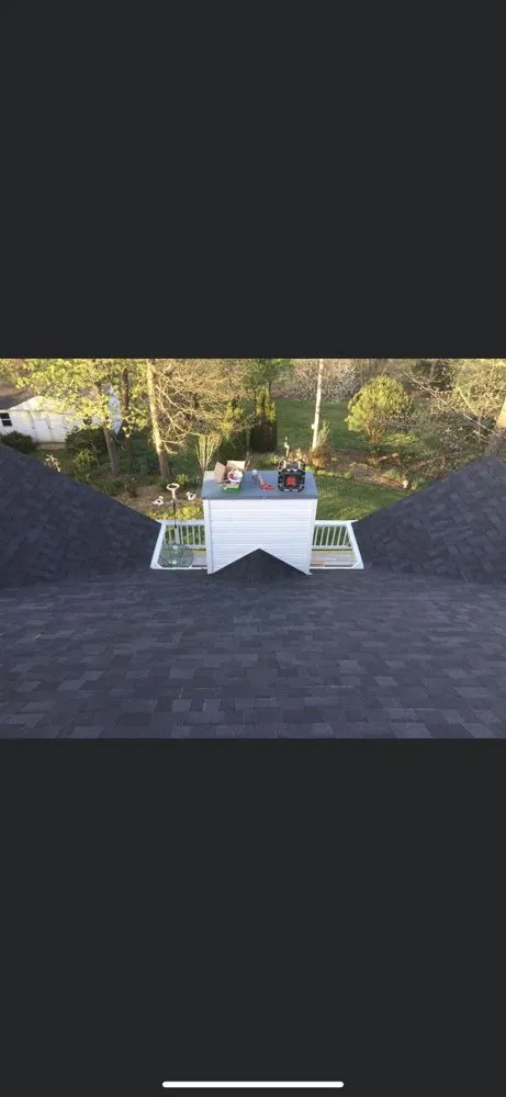 Slide of J&C Roofing and Construction