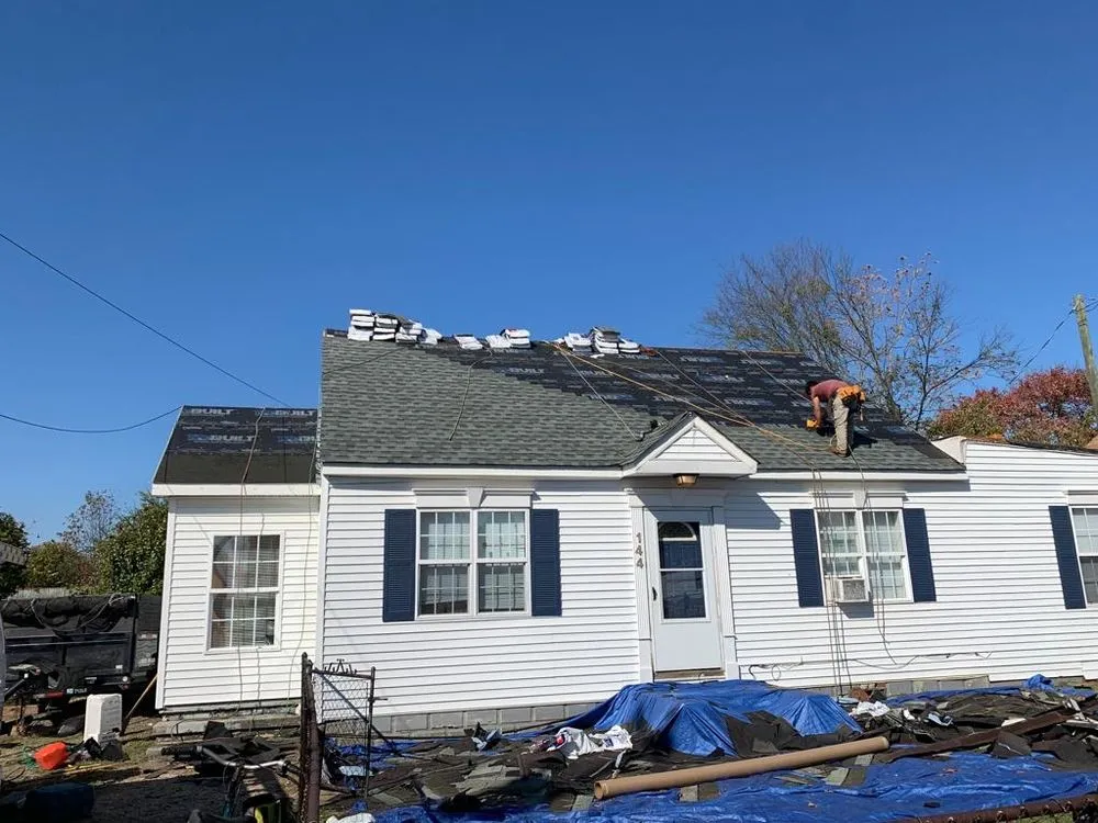 Slide of JC Roofing Installations