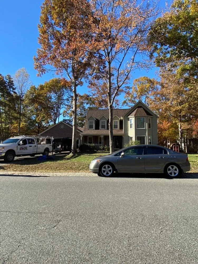 Slide of JC Roofing Installations
