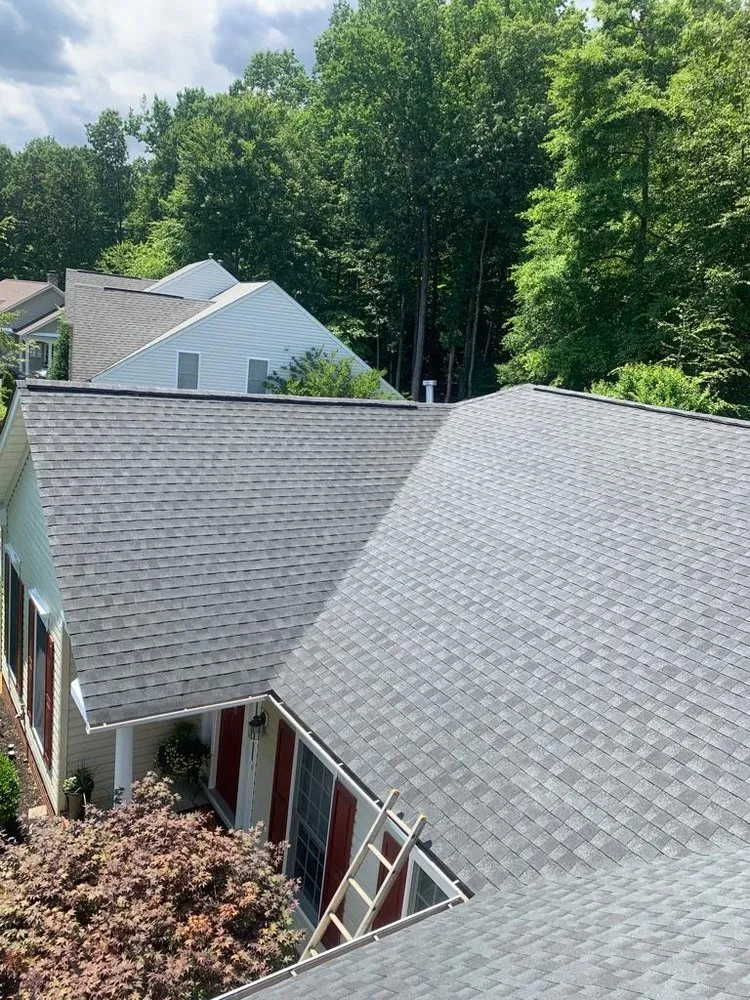 Slide of JC Roofing Installations