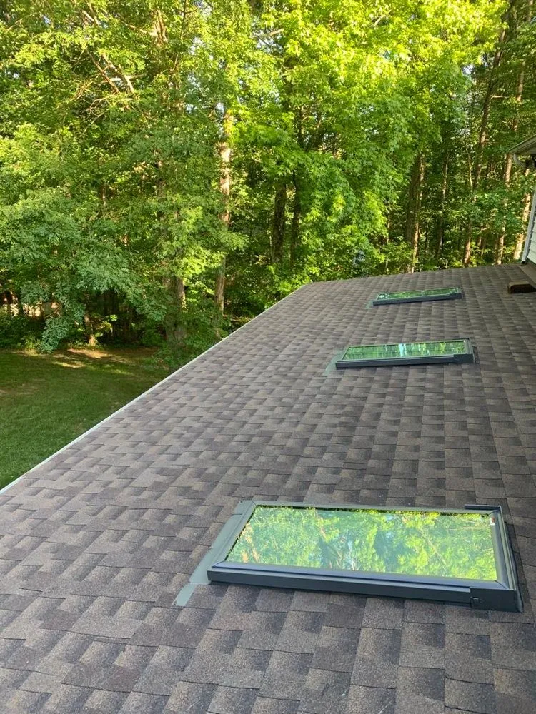 Slide of JC Roofing Installations