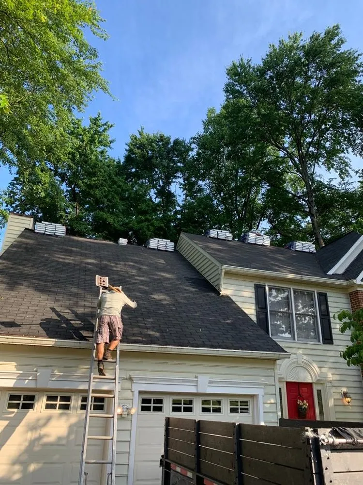 Slide of JC Roofing Installations