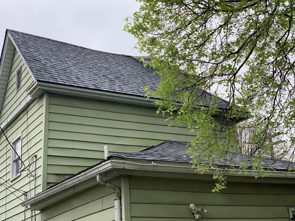 Slide of JC Roofing Supply