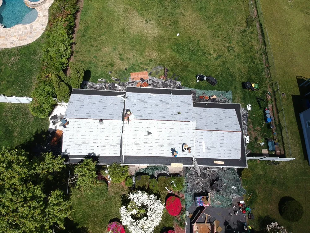 Slide of J&C Roofing