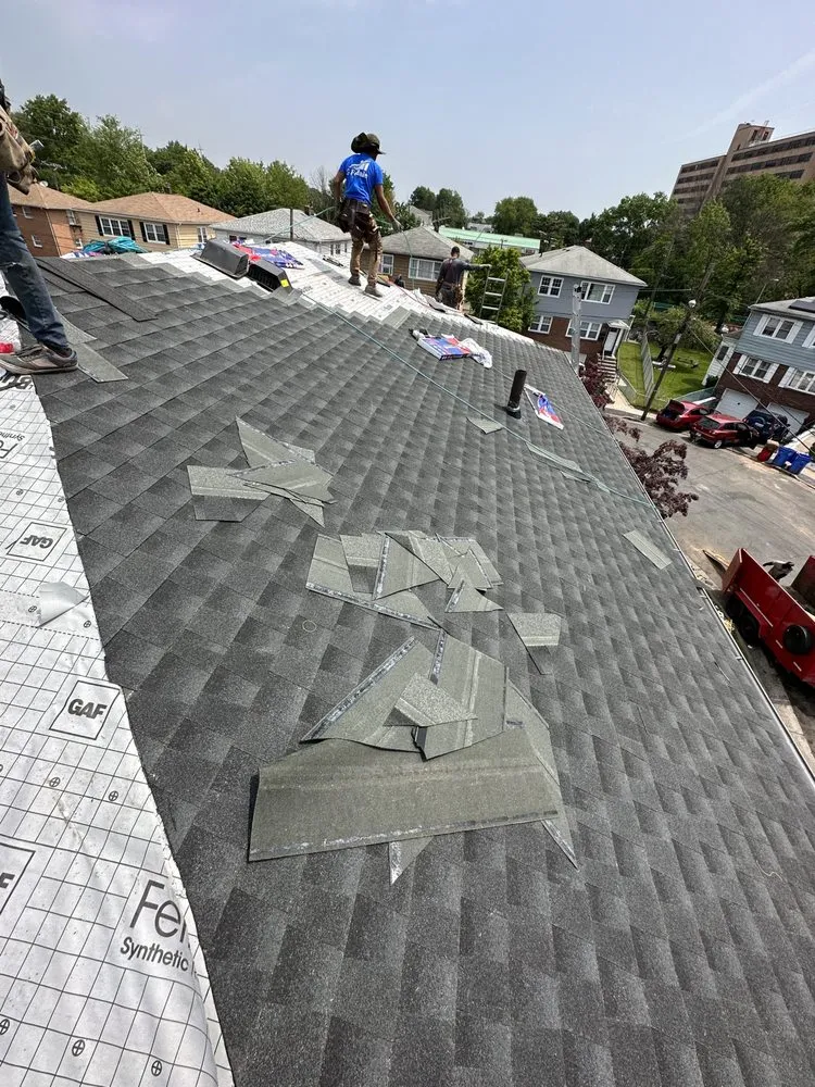 Slide of J&C Roofing
