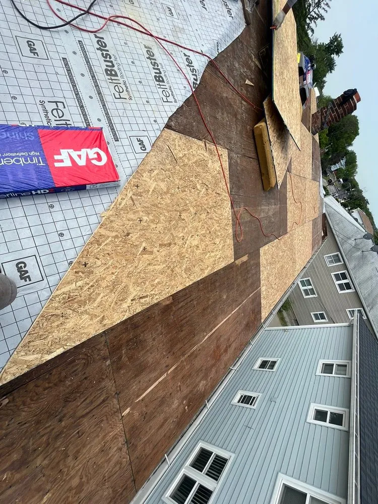 Slide of J&C Roofing