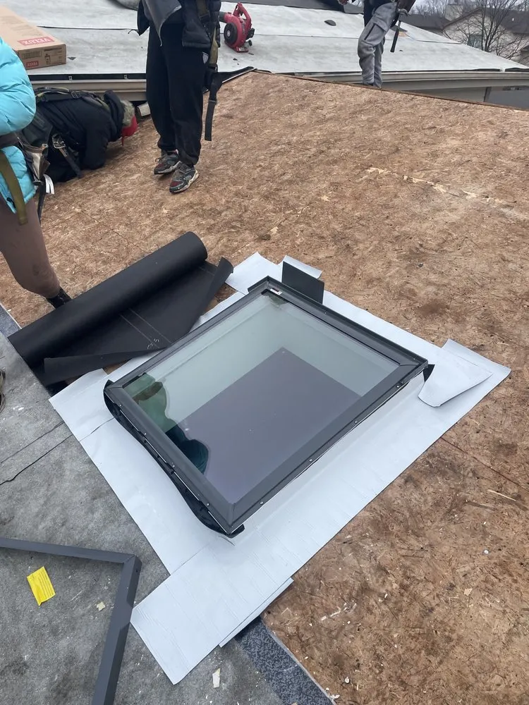 Slide of J&C Roofing