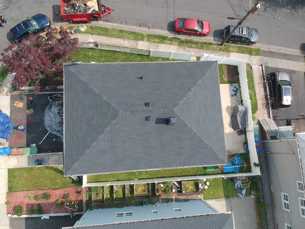 Slide of J&C Roofing