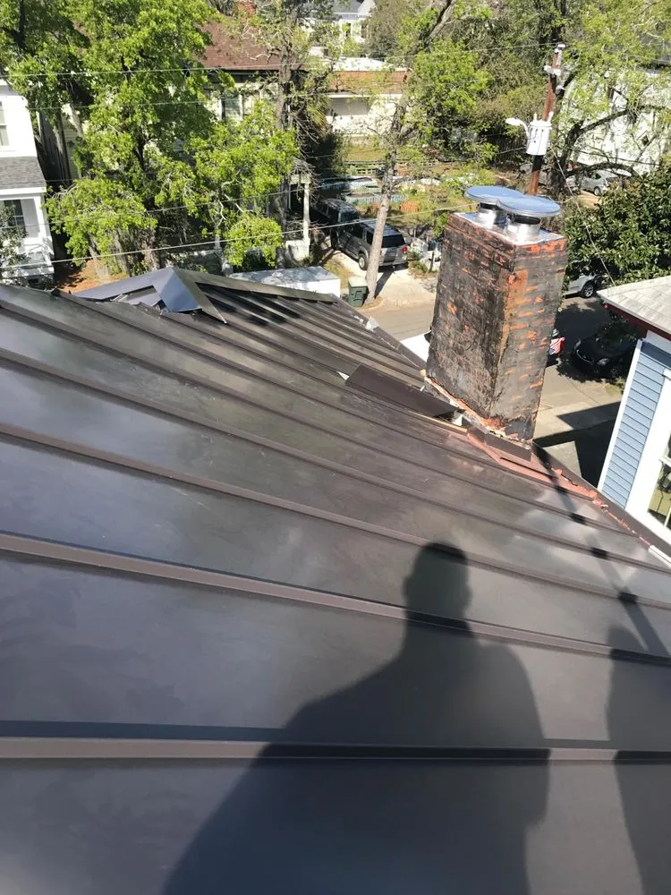 Slide of JCB Roofing