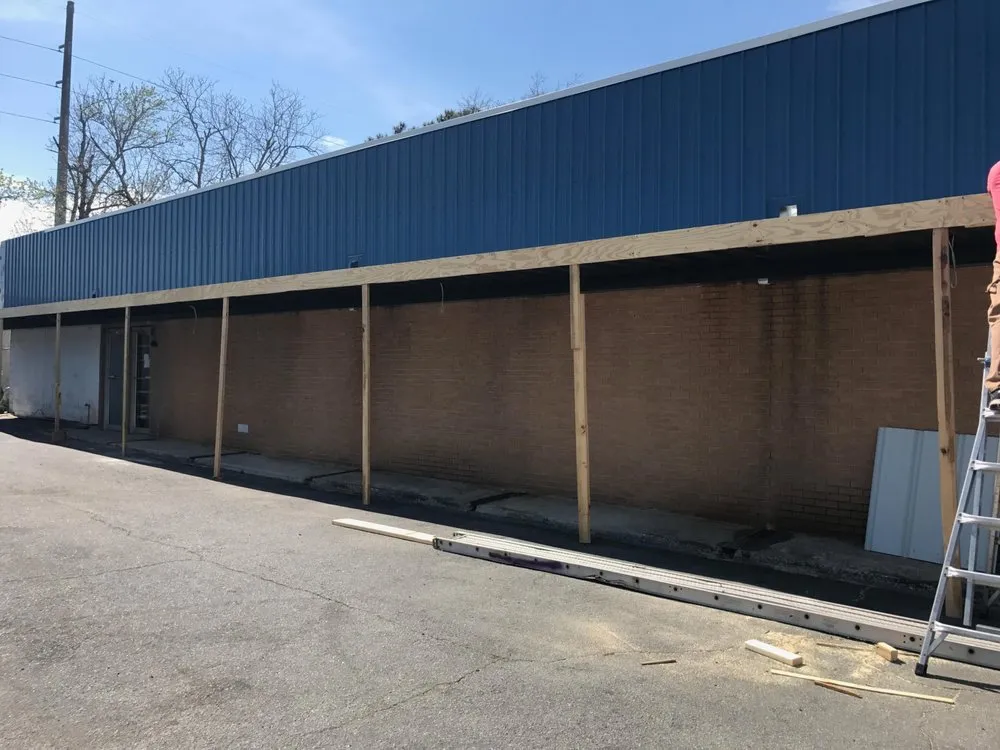 Slide of JCB Roofing