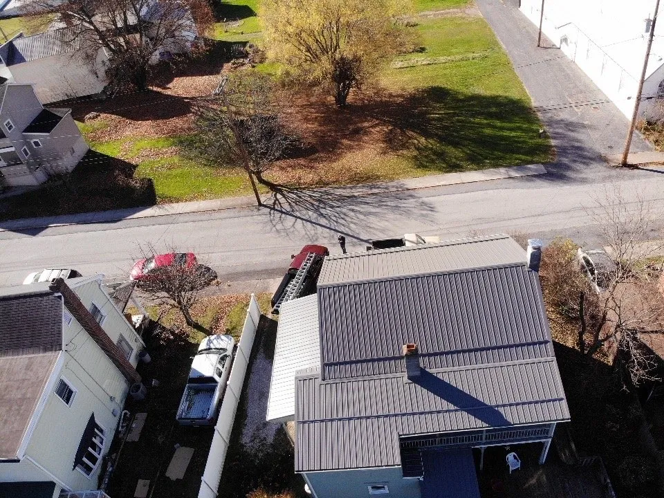 Reliable flat roof repair same-day service in Osterburg, PA by JD Construction Metal Roofing