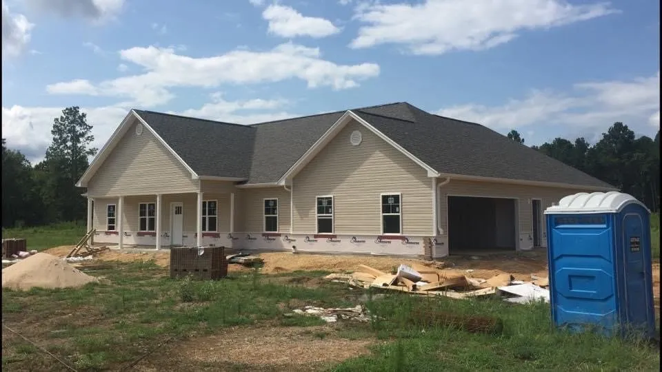 Slide of JD Custom Vinyl Siding & Seamless Gutter