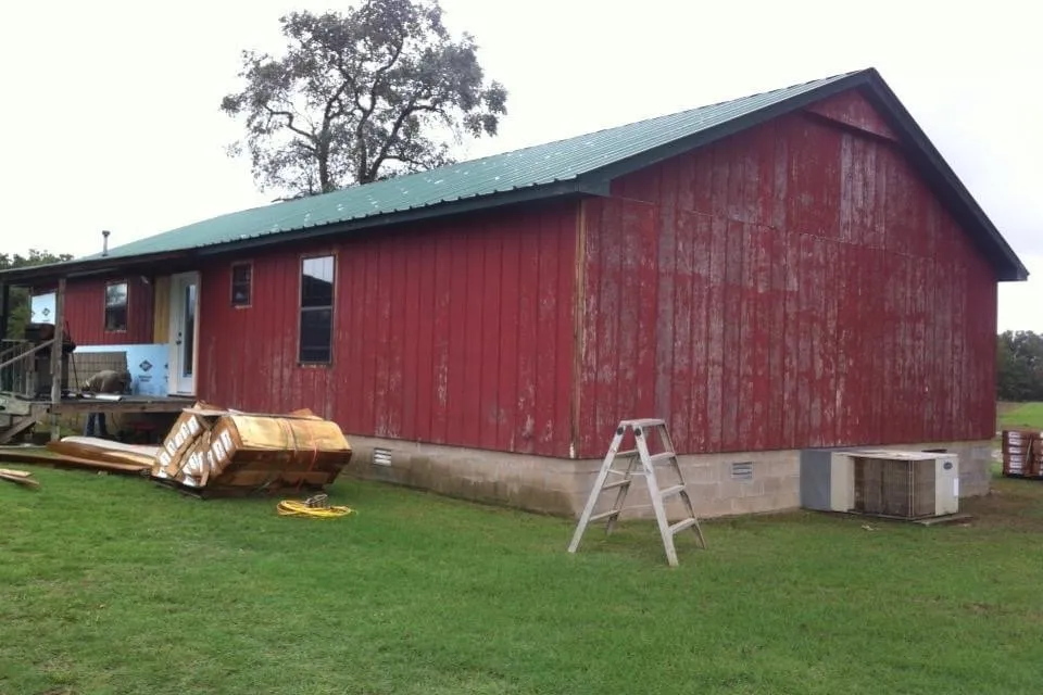 Slide of JD Custom Vinyl Siding & Seamless Gutter