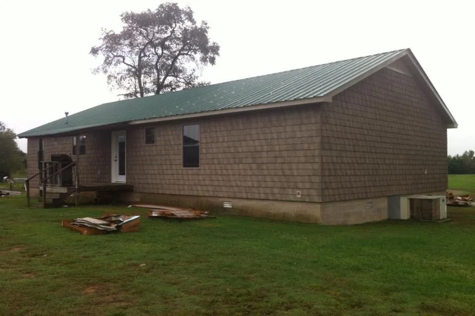 Slide of JD Custom Vinyl Siding & Seamless Gutter