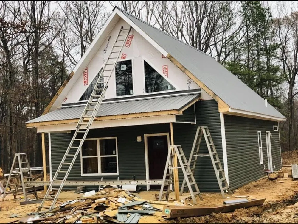 Slide of JD Custom Vinyl Siding & Seamless Gutter