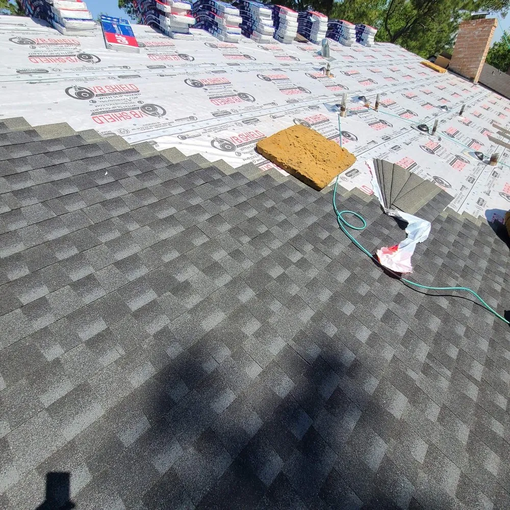 Slide of JD Roofing Solutions