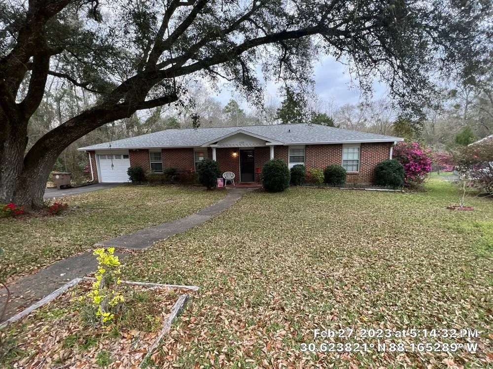 Slide of JD Titan Roofing of Mobile