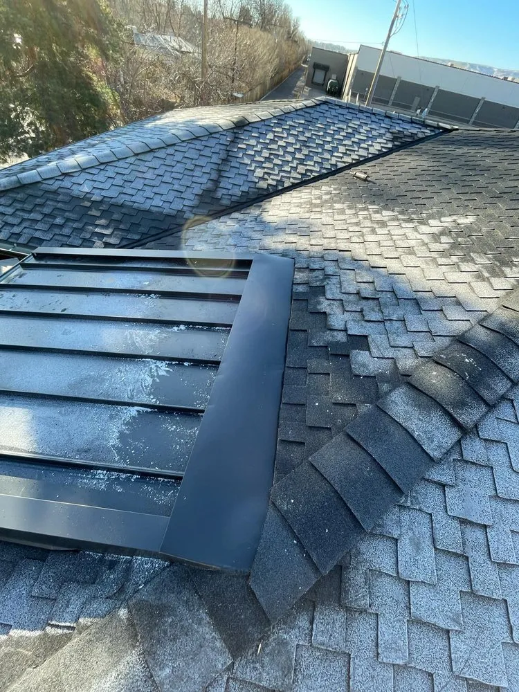 Slide of JD’s Roofing Construction