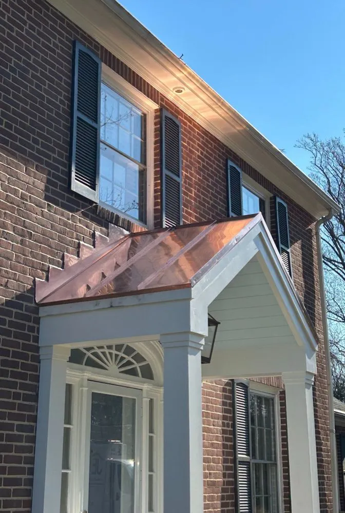 Slide of JE Custom Contractors