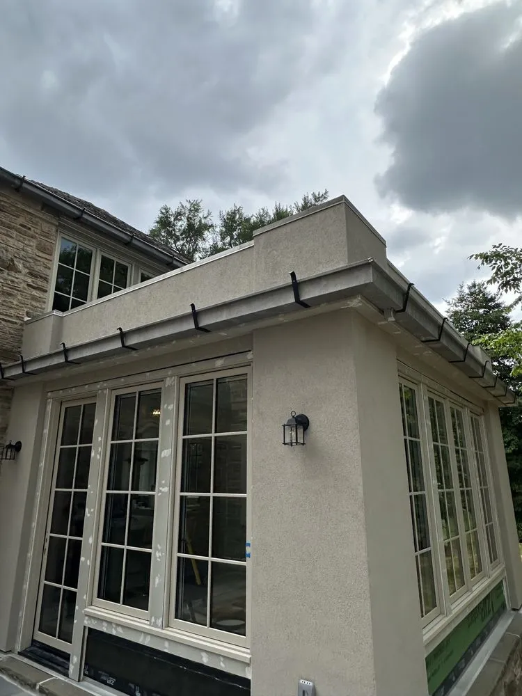 Slide of JE Custom Contractors