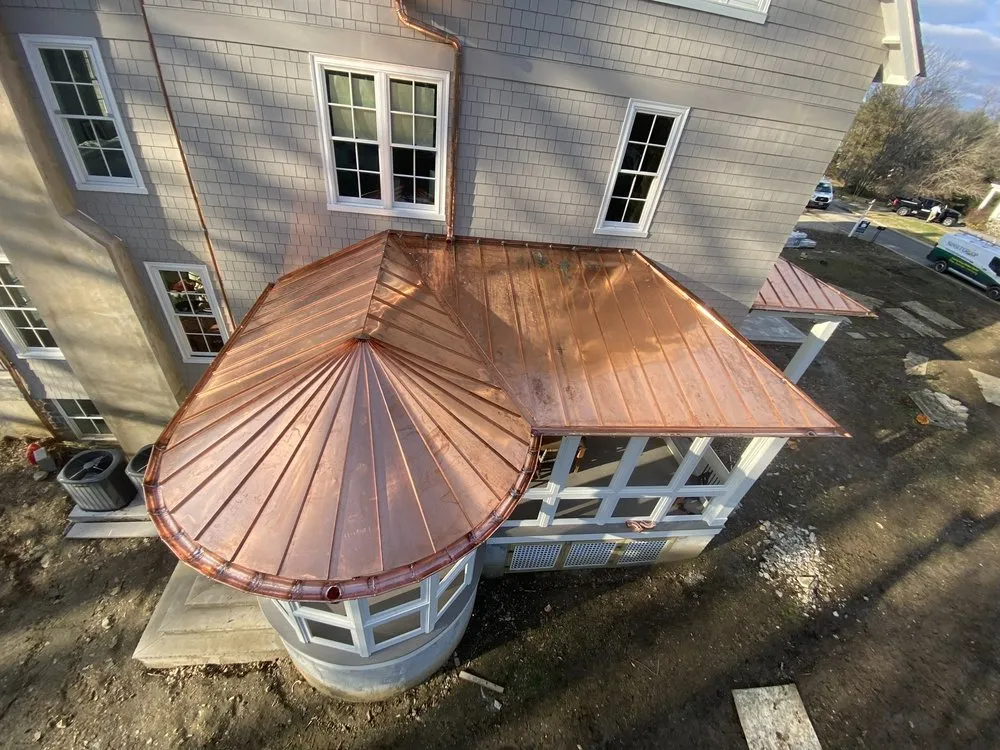 Slide of JE Custom Contractors