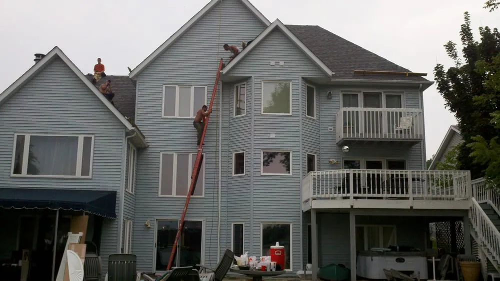 Slide of JE Roofing & Construction