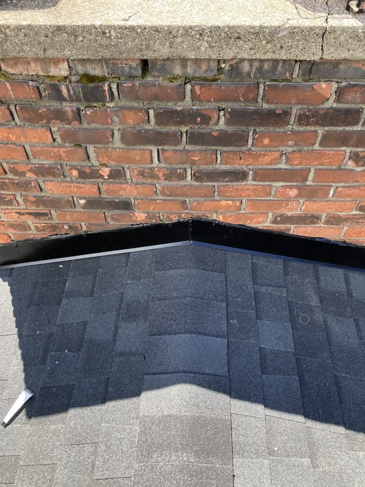 Slide of J&E Roofing & Repairs