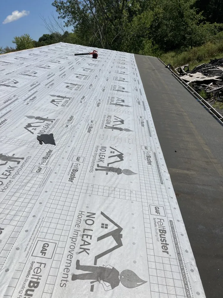 Slide of J&E Roofing & Repairs