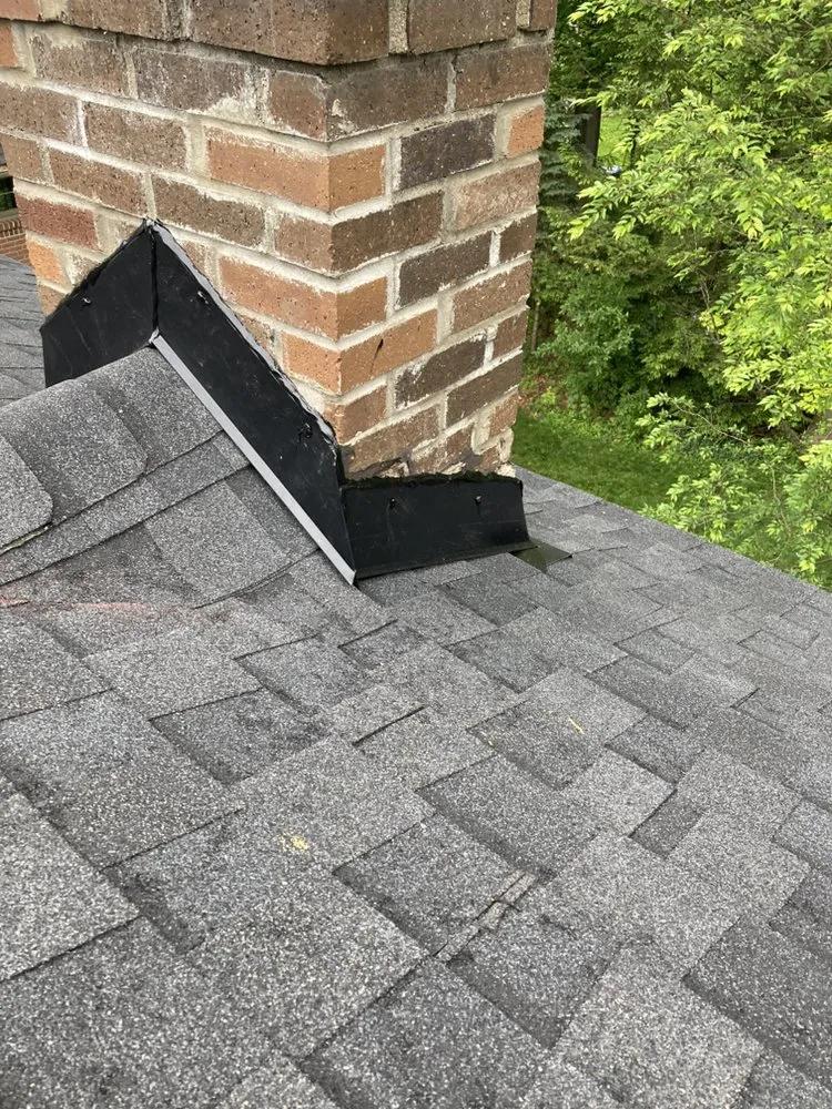 Slide of J&E Roofing & Repairs