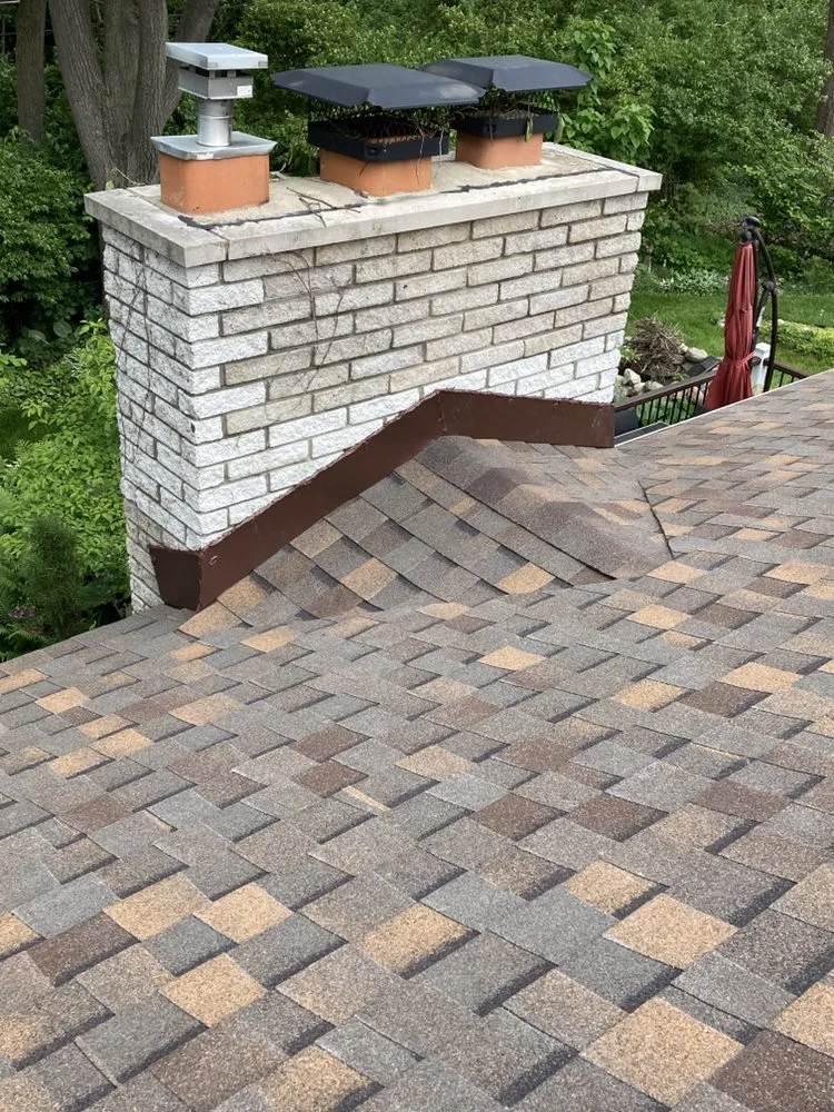 Slide of J&E Roofing & Repairs