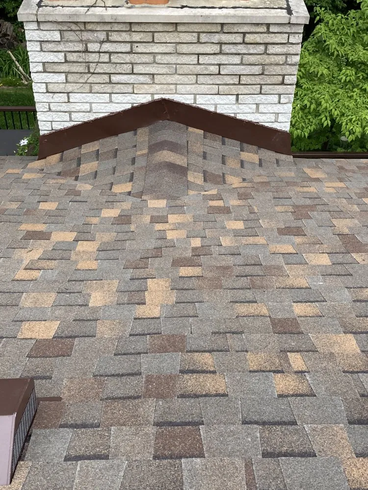 Slide of J&E Roofing & Repairs