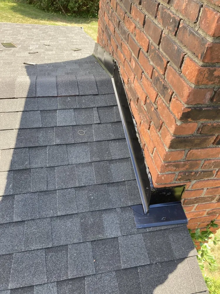 Slide of J&E Roofing & Repairs