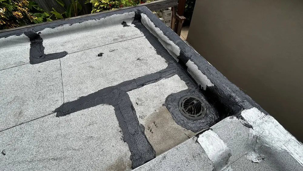 Slide of J&E Roofing Services