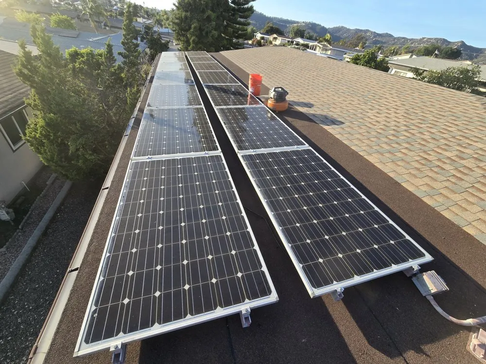 Slide of J&E Roofing Services