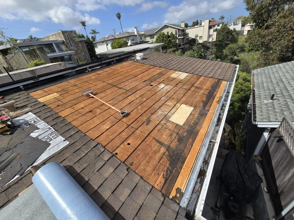 Slide of J&E Roofing Services