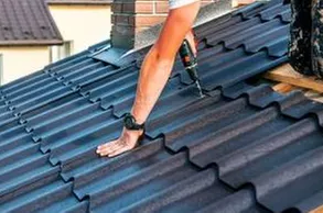 Slide of J&E Roofing Solutions