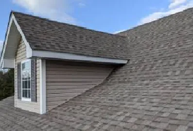 Slide of J&E Roofing Solutions