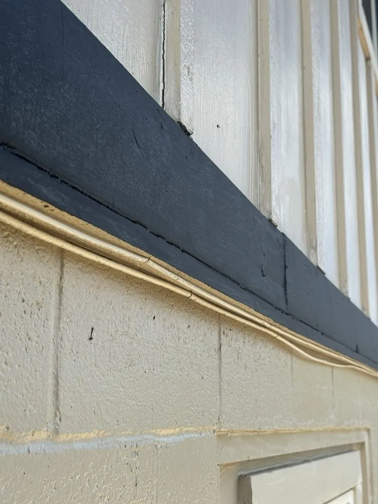 Slide of J&E ROOFING