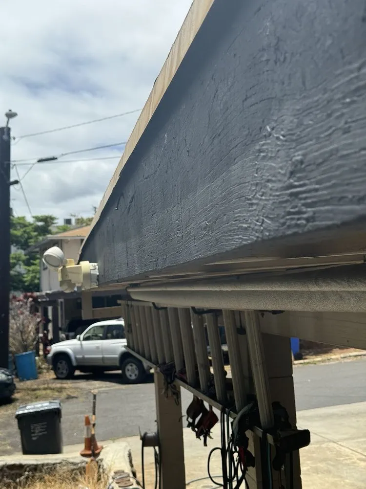 Slide of J&E ROOFING