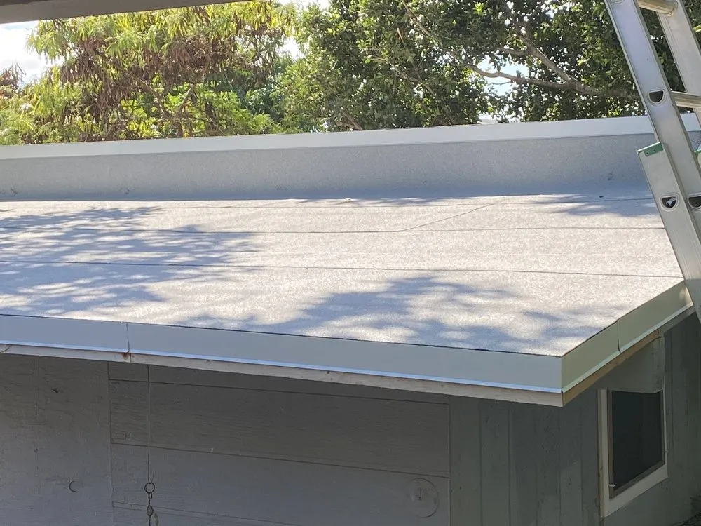 Slide of J&E ROOFING