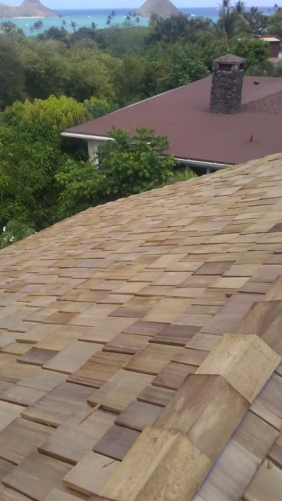 Slide of J&E ROOFING