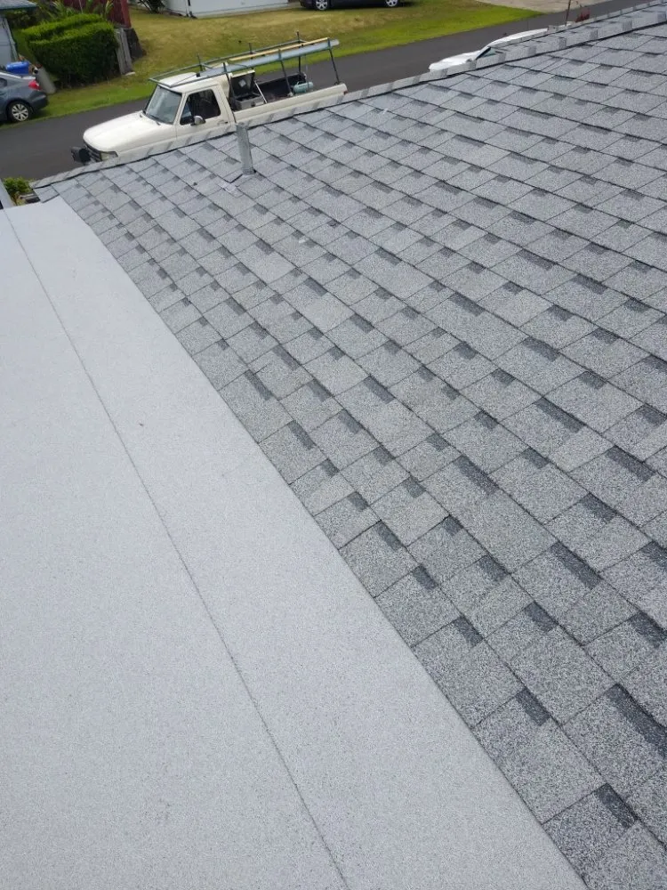 Slide of J&E ROOFING