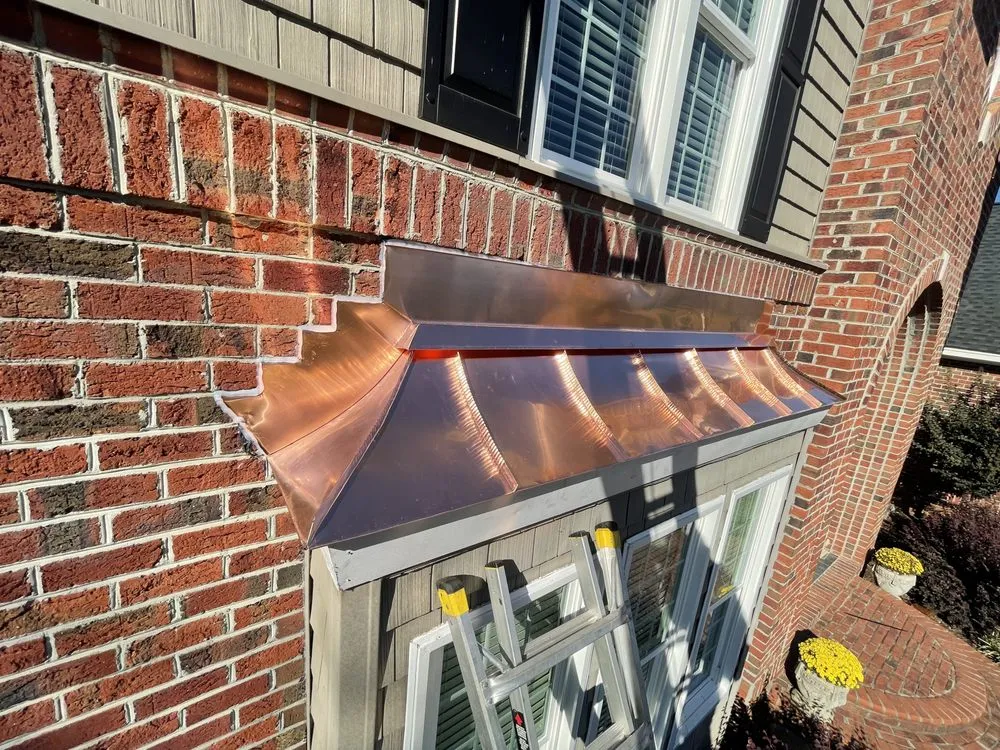 Slide of JEC Metal Roofing