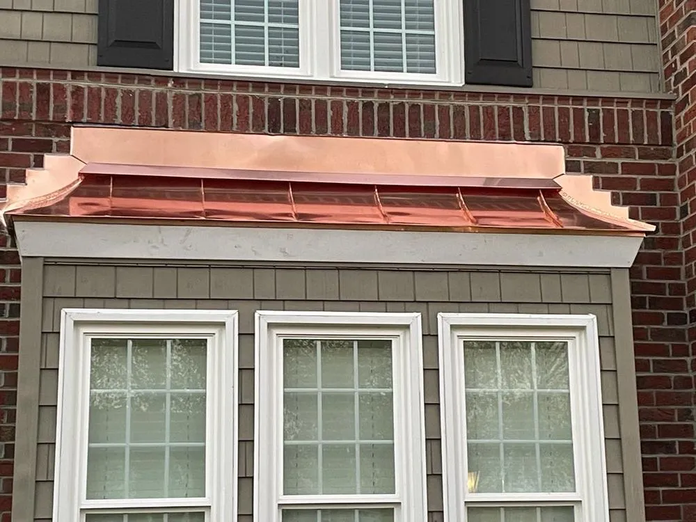 Slide of JEC Metal Roofing