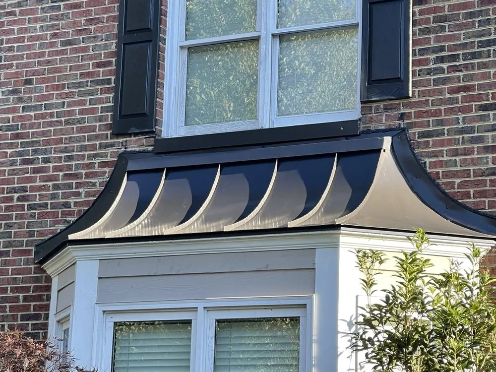 Slide of JEC Metal Roofing