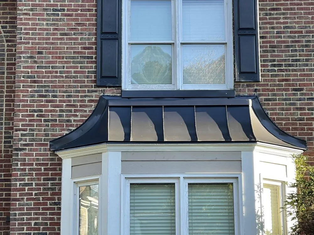 Slide of JEC Metal Roofing