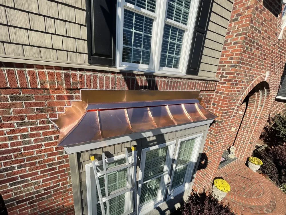 Slide of JEC Metal Roofing