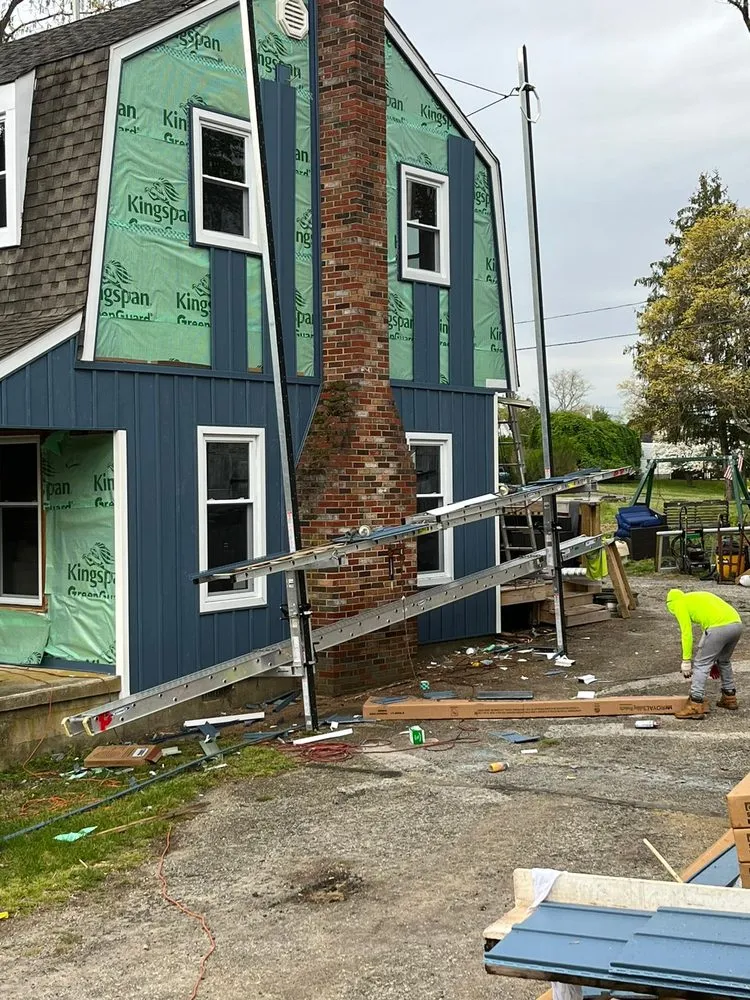 Slide of Jeff & Peter General Construction